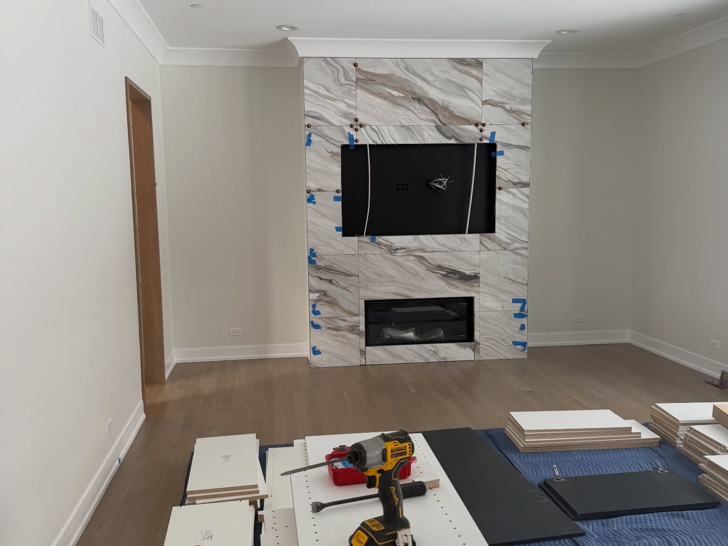 Marble fireplace surround installation in progress