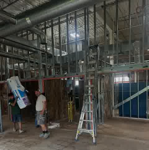 Insulation being installed in a new construction project